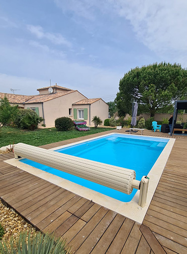 constructeur moyenne piscine 6mx3m avec volet securite - pisciniste Charente-Maritime 